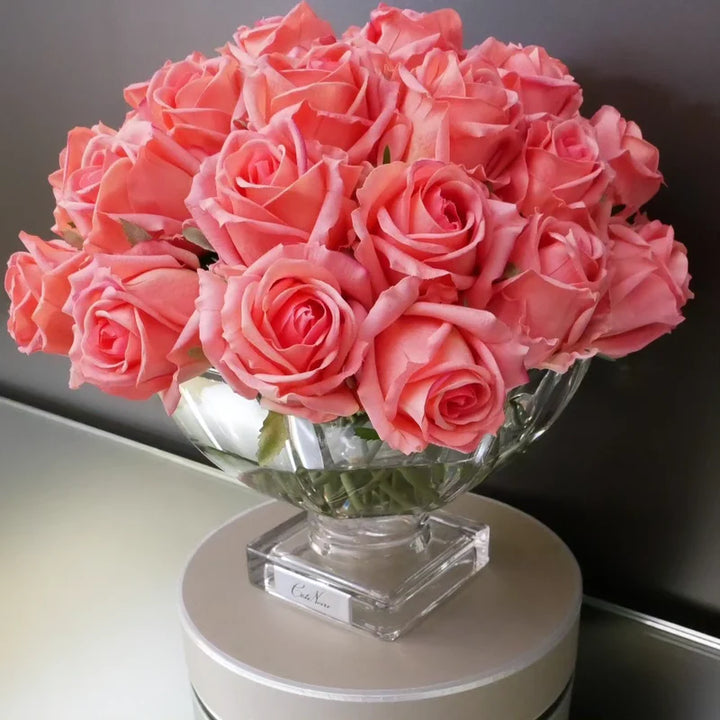Centrepiece - Peach rose buds with Silver Badge