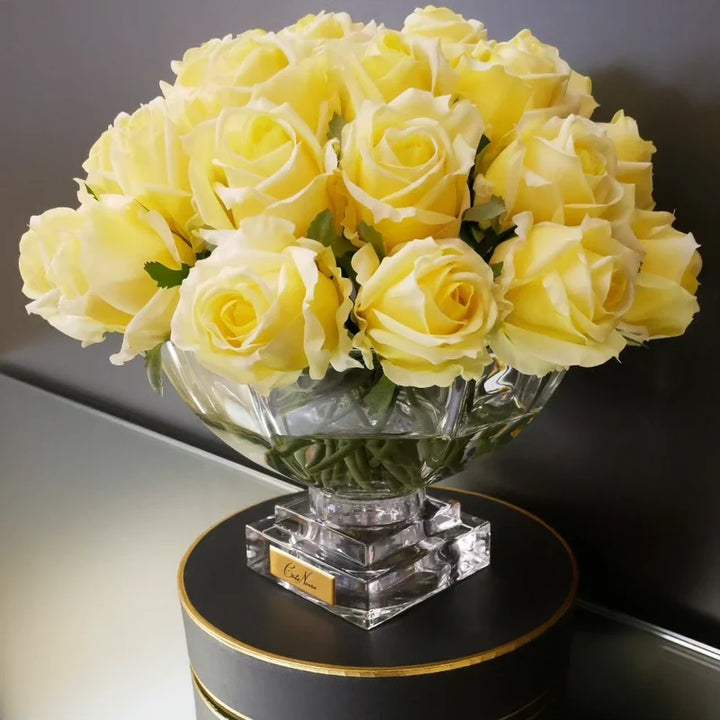 Centrepiece - Yellow rose buds with Gold badge